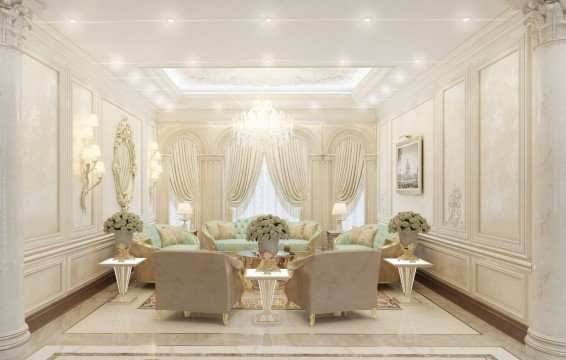 This picture shows a luxurious foyer inside a modern home. The walls are adorned with elegant white and gold wallpaper, while the floors feature a glossy black and white marble tile pattern. The ceiling is painted a light grey and has elegant crystal chandeliers that hang from the ceiling. There is a curved staircase with ornate gold railings and a large mirror on the wall next to it. On either side of the stairs are two tall wooden vases filled with flowers and greenery for a bright and lively look.