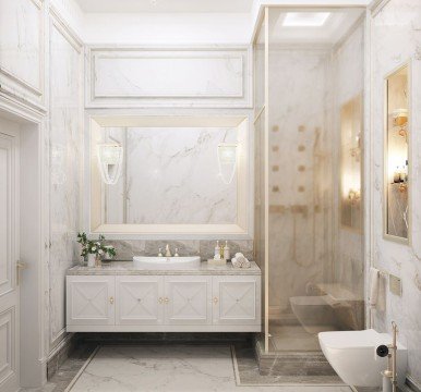 This picture shows a beautiful bathroom with marble walls and floor. The floor and walls are adorned with intricate tile designs in shades of white, beige, and gray. There is a large soaking tub with a window above it, letting in natural light. The room also has a double vanity with a large mirror and marble countertop, as well as two built-in shelves and lighting fixtures.