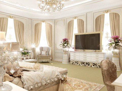 This image shows an opulent bedroom decorated in a luxurious style. It features a pristine white bed with four intricate columns, draped with soft white curtains, and topped with gold accent pillows. The walls are adorned with heavily detailed gold and white wallpapers, and the ceiling features intricate sculptures and designs. The floor is covered in a rich, cream-colored rug. The room contains two nightstands with golden lamps and a large window with light pink, sheer curtains.