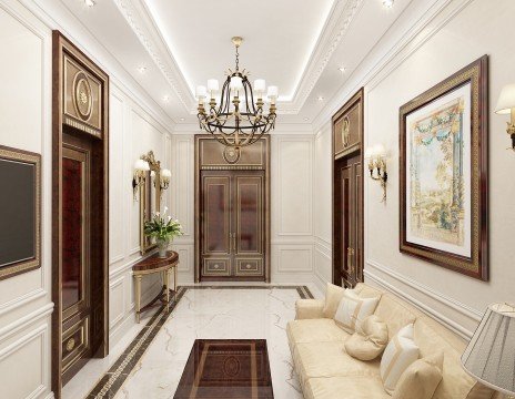 The picture shows a luxurious, minimalistic dining room with light marble floors, white walls and white ceilings. The room features modern, contemporary furniture including two upholstered chairs at a round glass dining table and a matching sideboard with a decorative accent vase and bowl on it. An intricate crystal chandelier hangs above the table, adding a touch of glamour to the room.