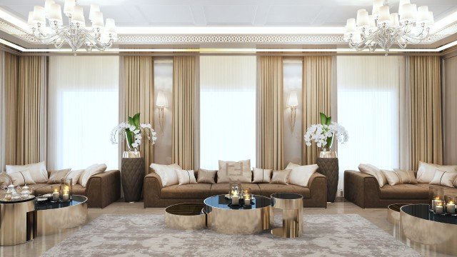 This picture shows a modern and luxurious living room designed with white furniture, hardwood floors, and an elegant chandelier hanging from the ceiling. There is also an abstract painting on one of the walls and floor-to-ceiling windows that allow natural light to brighten up the space. The room also features recessed lighting, a plush area rug, and an ornate mirror on the opposite wall.