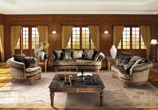 This image depicts a lavish living room with a modern touch. The furniture is exquisitely detailed, the lighting beautifully soothing and the colors tastefully chosen.