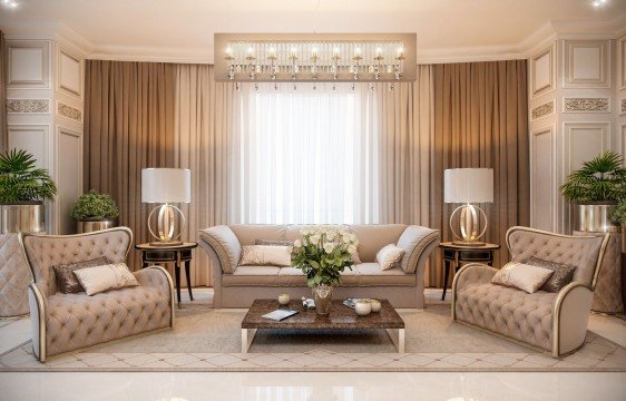 This picture shows a modern-style living room, designed with an elegant and contemporary decor. The room features luxurious furniture pieces, including an ivory and gold armchair with a black and white patterned ottoman and a glossy black coffee table. The walls of the room have been painted a light gray color and adorned with light gray curtains. Additionally, a large mirror and a unique art piece can be seen on the wall, while the floor is covered by a large cream-colored area rug.