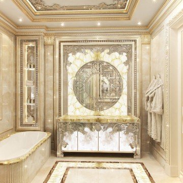 This picture shows a luxurious white marble bathroom with a modern design. The bathroom is equipped with two separate but connected washbasin vanities, a large and spacious soaking bathtub, and a custom walk-in shower with stainless steel fixtures. There is also a large window visible on the right side of the picture, allowing natural light to fill the room. Finally, the walls and floors are finished with high-end beige tiles, making it look even more sophisticated.