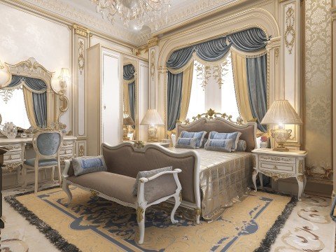 This picture shows a luxurious bedroom with a light blue color palette. The room features a large bed with an ornate headboard and base, along with several plush pillows and blankets. A white chaise lounge is in the corner, and opposite are two tall windows with elegant curtains. On the wall to the left is a large mirror framed in silver and there is a white dresser with a green vase on top. The floor is wood-laminate and some potted plants add a touch of greenery to the room.
