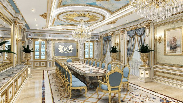 White wall decorated with golden molding and crystal chandelier.