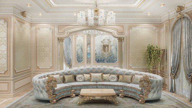 Luxurious contemporary sitting room, with luxurious velvet armchairs, elegant chandelier, and marble-tiled floor.