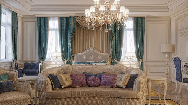 This is a photograph of a modern, luxurious bedroom. It features a large, four-poster bed with a decorative canopy, draped in sheer fabric. On the walls are beige, art deco style panels with gold accents, and on either side of the bed are large floor-to-ceiling windows draped in heavy curtains. The room is decorated with a variety of statement furniture pieces including a white faux fur bench, a patterned armchair, and an armoire. The ceiling has a stylish recessed lighting system, and throughout the room, there are various glass, ceramic