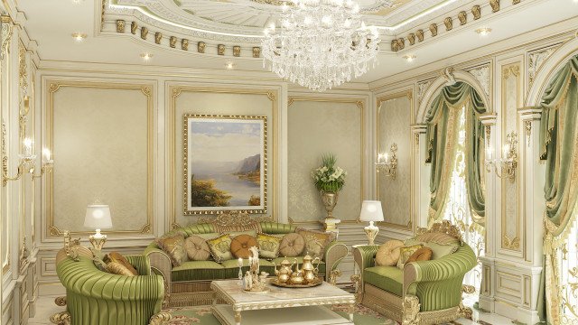 This picture shows a luxurious modern living room with sleek marble floors and gold accents. There is a beige sofa and armchair, topped with several embroidered pillows, in front of a fireplace. A large chandelier hangs from the ceiling and floor-to-ceiling windows give the room an open, airy feel. The walls are painted in a neutral shade, highlighting the other design accents.