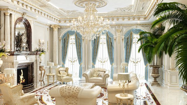 This picture is of an ornately decorated interior room in a high-end home. There is a luxurious cream-colored sofa on the left side of the room, with a matching cream-colored armchair and coffee table in front of it. The walls are painted with a pale yellow color, adorned with golden-framed mirrors in each corner. There is a grand chandelier hanging from the ceiling, and adorning the walls are several pieces of artwork. The floor has a patterned rug beneath the furniture, and surrounding the furniture are various decorative accents such as vases,