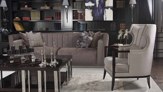 Luxurious modern living room, with inviting armchairs and elegant fireplace; perfect for a glamorous atmosphere.