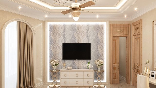 Modern luxury living room featuring beige walls and furnishings, accentuated with gold accents and a grand chandelier.