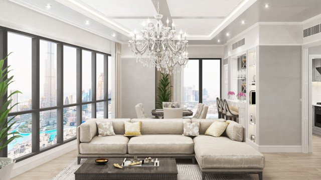 Modern living room interior with luxurious furniture, colorful accents and elaborate light fixtures.