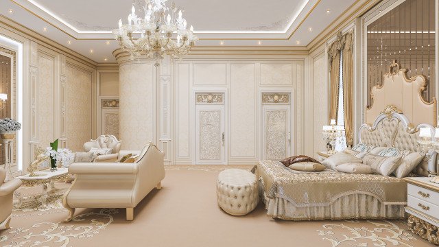 This picture shows a modern, urban living room designed by Antonovich Design. The room features an elegant off-white sofa, two velvet accent chairs, and a large decorative rug in shades of beige and brown. The walls are painted light grey, with white trim and detailed crown moulding. A rectangular wall-mounted mirror and a console table with drawers provide functional accents, while a crystal chandelier adds a luxurious touch. The room is also lit by wall sconces and several floor lamps, creating a warm and inviting space.