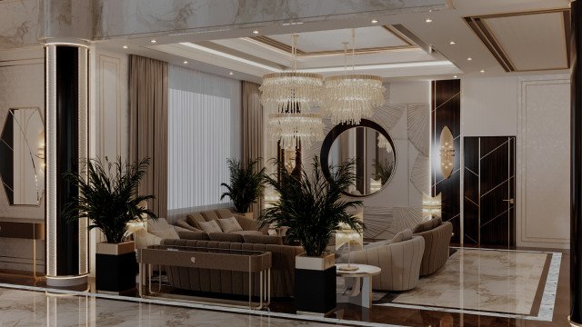 This picture shows a luxurious and modern living room designed by Antonovich Design. The room is decorated in shades of gray and gold, with blue accents. It features a large U-shaped sofa set up around a lavish fireplace, along with two comfortable armchairs. An ornate gold chandelier hangs from the ceiling, and several abstract wall art pieces adorn the walls. A low round table with a golden base and glass top is placed in the center.