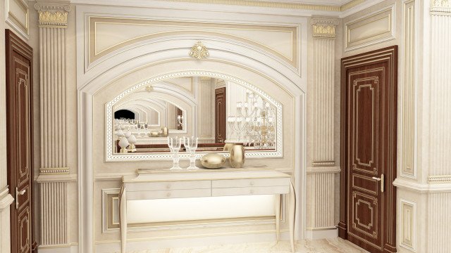 The picture shows a contemporary, luxurious interior design featuring a formal dining space. The room has white walls and grey marble floors. The furniture includes an exquisite oval-shaped dining table with intricately carved wooden legs, six stylish armchairs with silver accents, a round chandelier hanging from the ceiling, and a large buffet cabinet with glass doors. The walls feature several pieces of art including three abstract paintings. The overall look is modern and sophisticated.