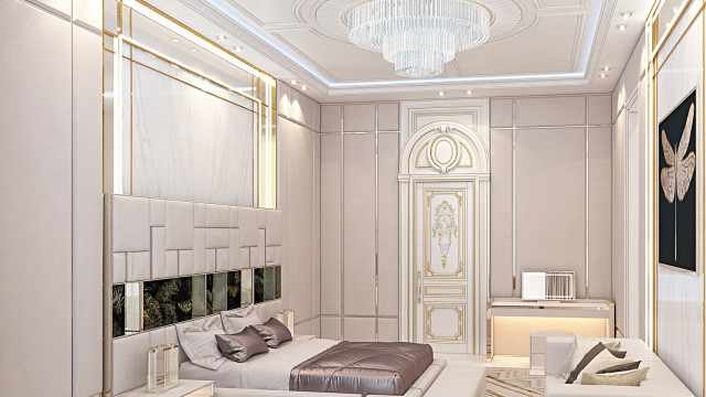 This picture shows an interior design project by Antonovich Design. It features a luxurious living room with modern furniture and decor. The walls feature an intricate and elegant wallpaper pattern, while the floor is covered in white marble tiles. The center of the room is dominated by a beautiful sofa set, with matching armchairs and an ornate coffee table. An ottoman, several throw pillows, and artwork provide the finishing touches to the room.