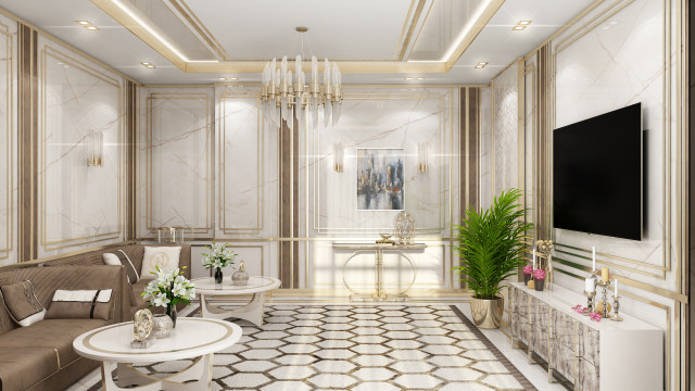 This picture shows a modern, luxury bathroom. It has marble floors, walls and countertops, with gold fixtures, including a faucet, spout, and light fixtures. There is a modern freestanding bathtub in the center, and two sinks along the wall. There is also a glass shower enclosure with a rainfall showerhead.