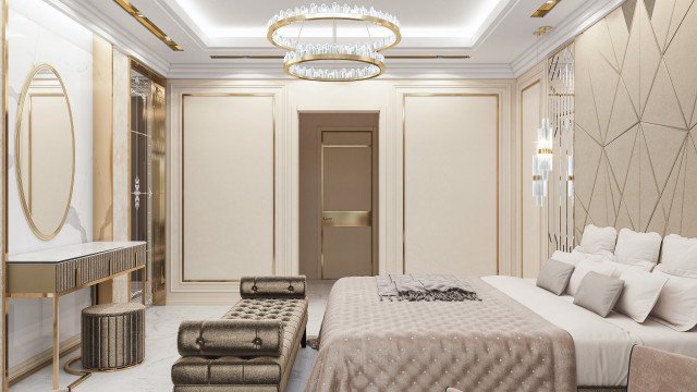 This picture shows an interior design space with a large bed in the center of the room. The bed is upholstered with white tufted fabric and has a light beige frame with four black legs on each corner. There is a matching white headboard and two nightstands, one on either side of the bed. The walls are painted in a light beige color, and there is a dark brown rug on the floor. On the opposite wall of the bed, there is a shelving unit and a large flat screen television mounted on the wall. The room is finished