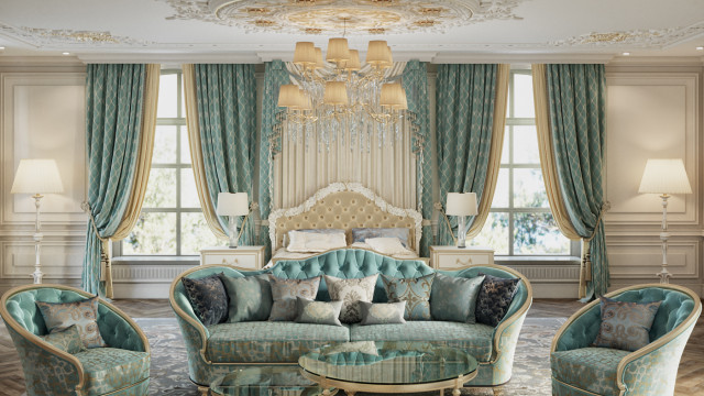 This image features a luxurious living room design. The room features an ornate and modern beige sofa, accented with red and gold pillows and draped in a luxurious velvet throw blanket. On the opposite side of the room stands a modern white and gold armchair, complemented by a glass coffee table with a contemporary abstract art piece above it. The walls are covered in a sophisticated beige and brown wallpaper and the floor is covered by cream-colored area rug.