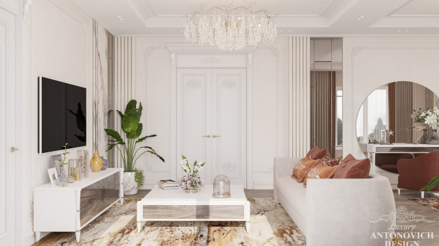 A modern and luxurious living room with a white marble floor, cream-colored walls, an elegant chandelier, and comfortable seating.