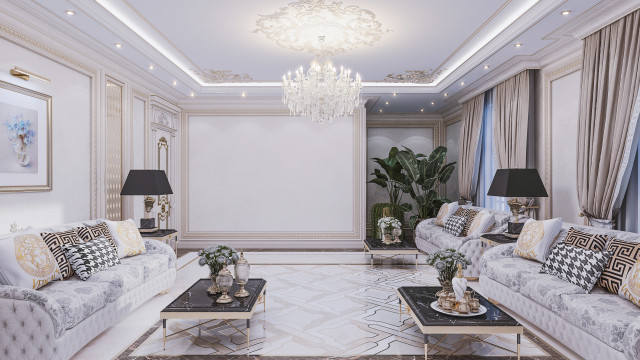This picture shows a modern and luxurious living room featuring a textured wall with built-in lighting, a crystal chandelier in the center of the room, a marble floor, and beige couches filled with comfortable pillows. There is also a glass coffee table with a white orchid on top and a few pieces of modern artwork on the walls. Overall, this room exudes elegance and sophistication.