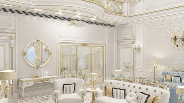 A luxurious, palatial interior featuring ornately decorated furnishings and detailing, warmly illuminated by a large chandelier and numerous wall lamps.