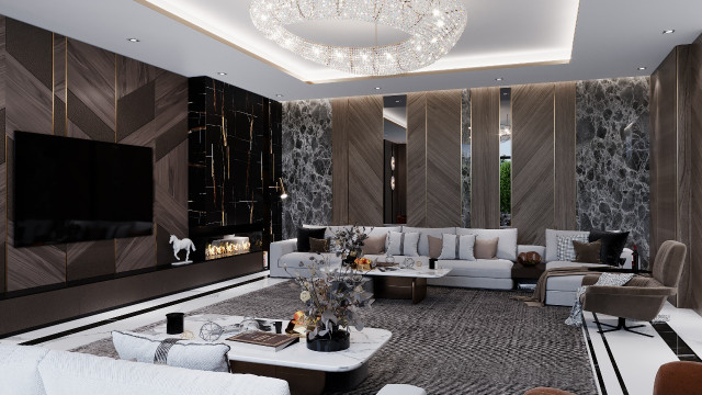 This picture is of a modern living room interior design. The room has a light gray wall with a built-in entertainment center and a white marble fireplace surround. In the center is a low, contemporary sofa with an off-white fabric upholstery. There is also a black leather armchair and a large area rug. A sleek, rectangular coffee table stands between the sofa and armchair. On the walls are two large art pieces, one of which is an aerial beach shot and the other a map of the world. Finally, there is a unique arc-shaped floor lamp at the