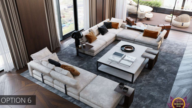 A contemporary, open-concept living space featuring a chaise lounge, armchairs, and an intricately tiled center table.