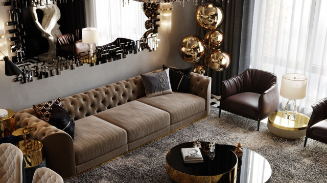 This picture shows a well-decorated living room. The walls are painted in an off-white shade and accented with ornate wall sconces. The floor is covered with a light brown rug and there is a large, comfortable leather couch in the center of the room. In addition, there is a contemporary-style coffee table in front of the couch, as well as a few side tables and end tables throughout the room. The window is dressed with sheer white curtains and the ceiling is adorned with a beautiful chandelier.