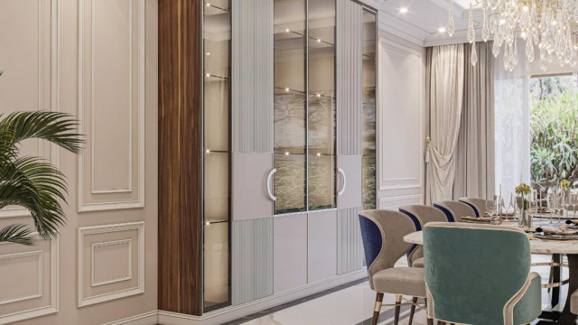 An interior design with a pastel color palette, high-end furniture, and luxurious finishes.