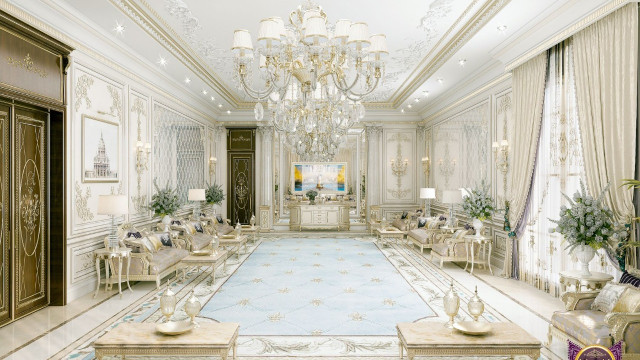 jpgThis picture shows a luxurious and elegant living room with stunning interior design. The walls are covered in golden patterned wallpaper, and there are several large windows with white curtains. The floor is textured marble, and there is a velvet cream sofa and armchair set centered between two cream loveseats. A pink velvet ottoman serves as a coffee table, and an intricately designed gold chandelier hangs above the seating area. On the wall above the sofa, there is a decorative artwork, and stylish floor lamps are found in two of the corners.