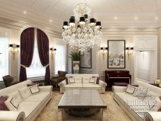Luxurious bedroom features a large king-size bed, stylish armchairs, and an elegant chandelier. Perfect for relaxation!