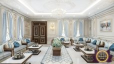 Luxurious living room: elegant beige armchairs and sofas, marble floor, high ceiling with crystal chandelier