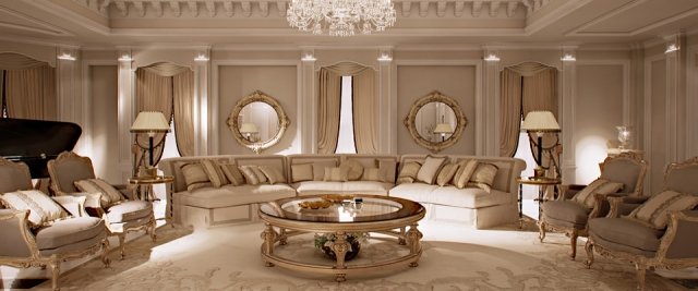 This picture shows a luxurious living room with a custom-designed modern furniture set. The room includes a plush sectional sofa in a light beige upholstery, as well as a matching armchair and ottoman. In the center of the room is an elegant coffee table on a rug with intricate geometric patterns. The walls are decorated with wooden paneling, and a large crystal chandelier is suspended from the ceiling. A large glass door leads out to a terrace, offering views of an outdoor area with plants and trees.