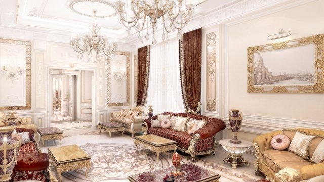 This picture shows a grand living room with gold-gilded walls and ornate decor. The luxurious living room features a large sofa set up in the center of the room, with two matching armchairs and an elegant rug. A round glass coffee table and a crystal chandelier add sophistication to the room. In the background, a stunning staircase leads up to a balcony, with a window revealing the lush landscape outside.