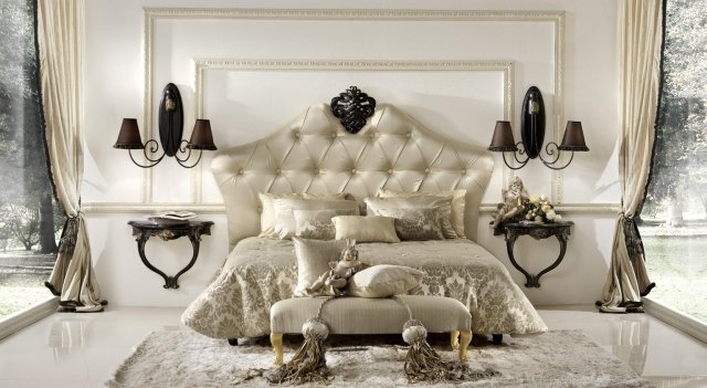 This luxury interior design features an ornate modern living room, with a plush sofa set, gold-trimmed ceiling, and elegant decorative pieces.